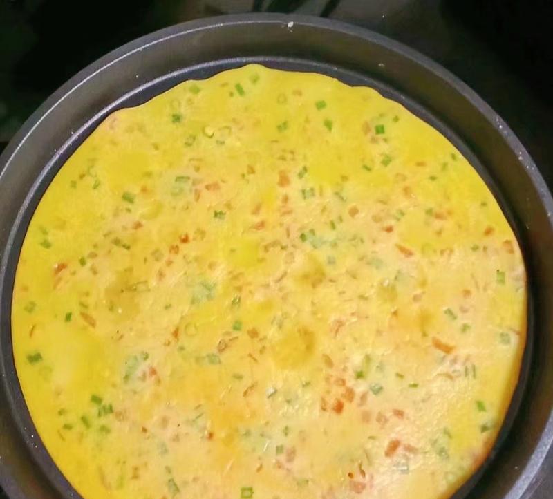 美味易做的以西红柿鸡蛋饼（教你用简单的材料做出营养丰富的早餐）