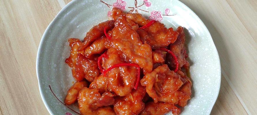 自制锅包肉的绝妙秘诀（手把手教你做出鲜香美味的锅包肉）
