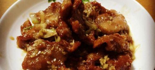 正宗地道吉锅包肉的制作秘籍（传承百年美食，舌尖上的中国味道）