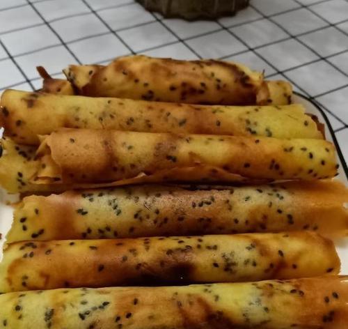 手工脆皮蛋卷的制作方法（做法简单易学，让你在家也能轻松制作美味脆皮蛋卷）
