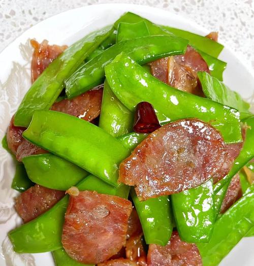 土猪肉炒荷兰豆的做法（简单易学，美味可口的家常菜）