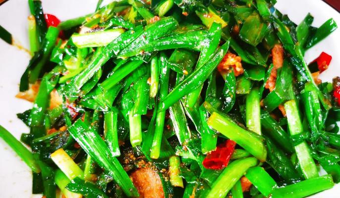 用孜然圆葱调味，轻松炒出美味肉片（一道简单易学的家常菜，让你的餐桌更加丰盛多彩）